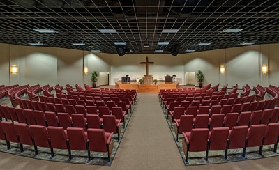 Illuminated sanctuary at Harvest Bible Church.